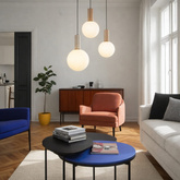 Pendant lamp Testa beige triple white globe shades over table