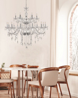 Gold chandelier with crystals 18xE14 Maria Teresa 30-94615