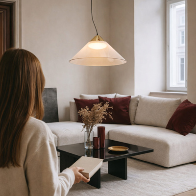 Pendant lamp Presto 42 glass gold with amber shade over table GX53